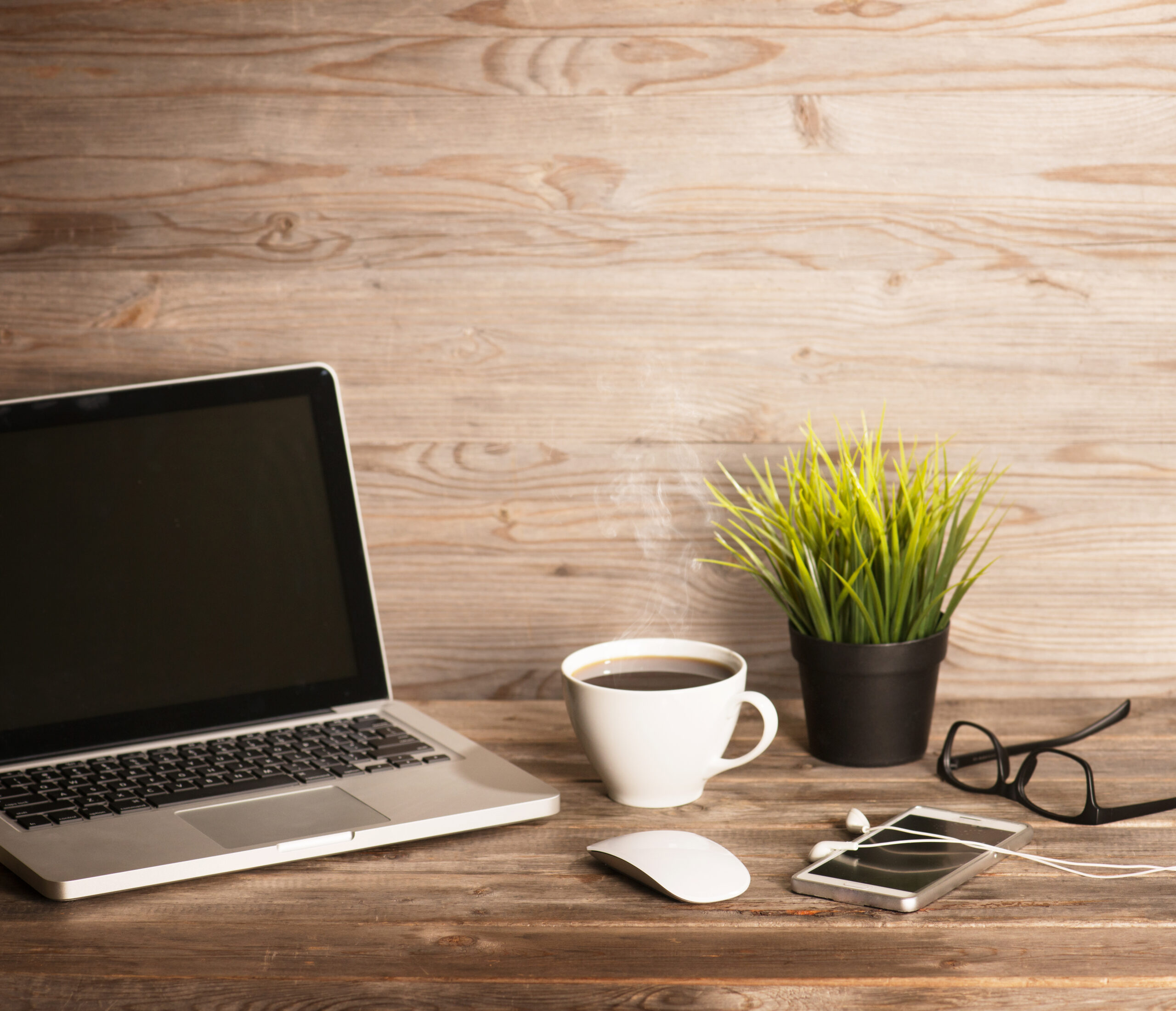 tea and computer at desk